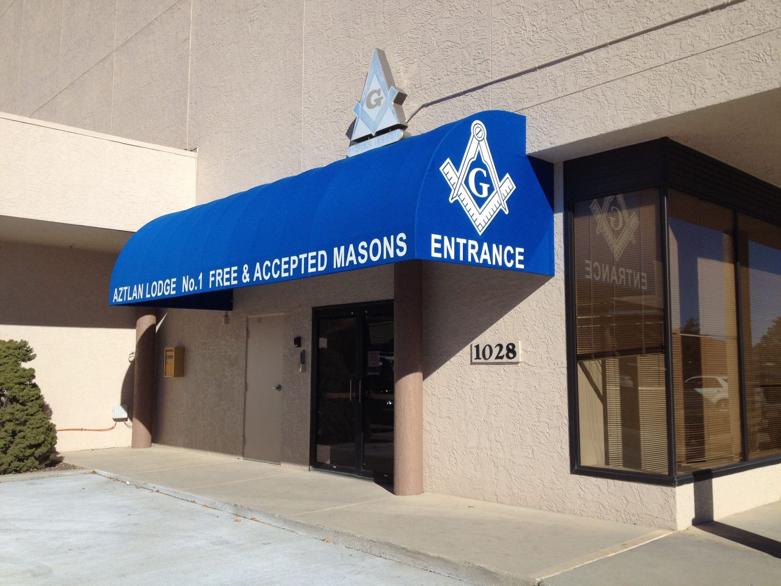 Commercial Window and Storefront — custom shade by A Shade Beyond